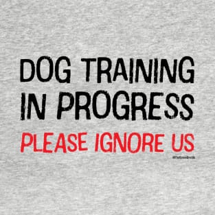 Dog Training in Progress (Black & Red Text) T-Shirt